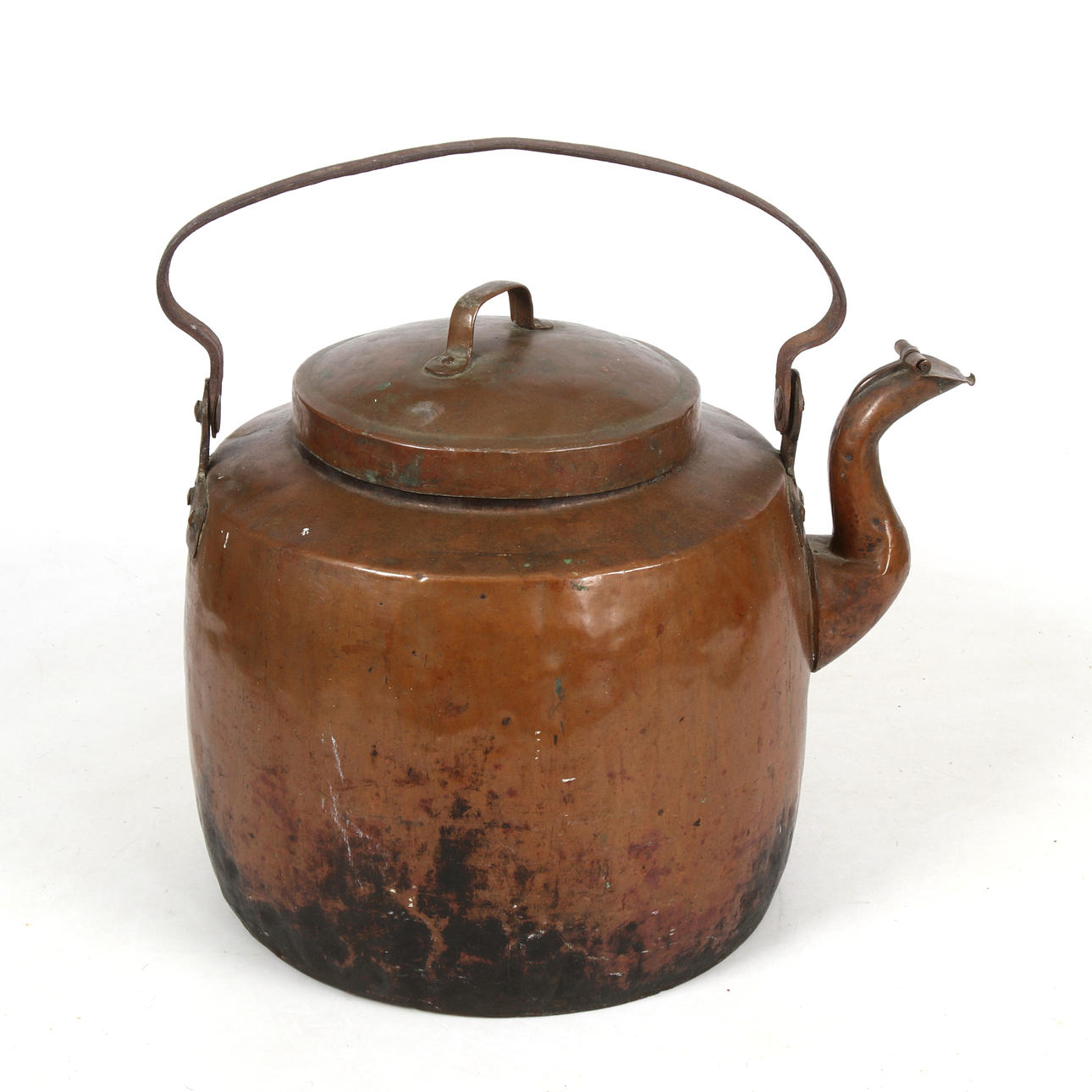 A 19th century copper coffee pot.