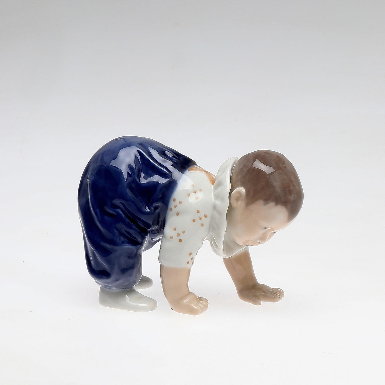 FIGURIN, porslin, krypande barn, Royal Copenhagen, Danmark.