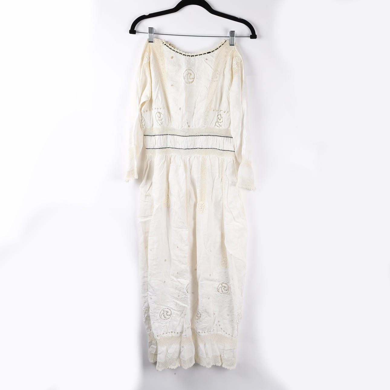 AN EDWARDIAN WHITEWORK DRESS.