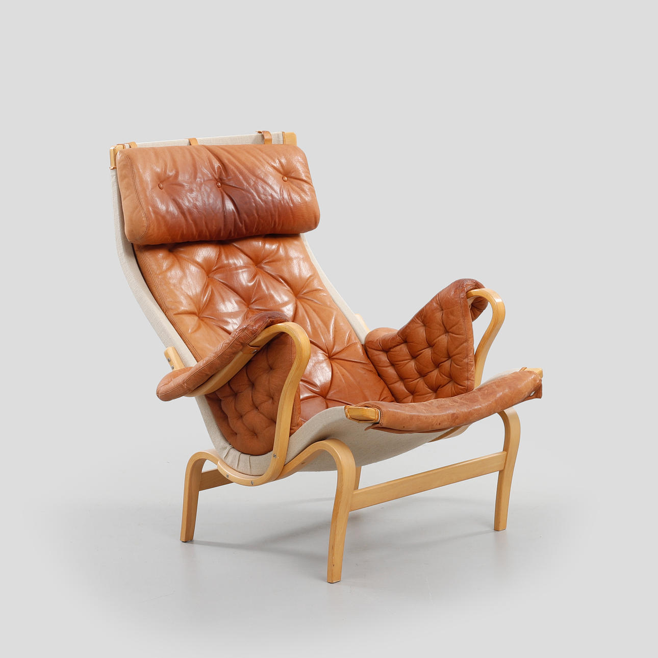 BRUNO MATHSSON. Fåtölj, "Pernilla", Dux, brännmärkta.