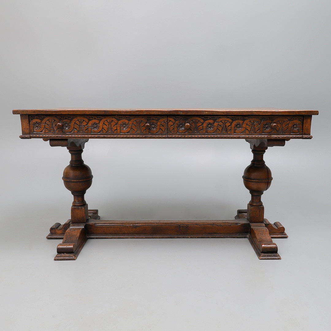 A REPRODUCTION CARVED OAK LIBRARY TABLE, IN TUDOR STYLE. Furniture ...