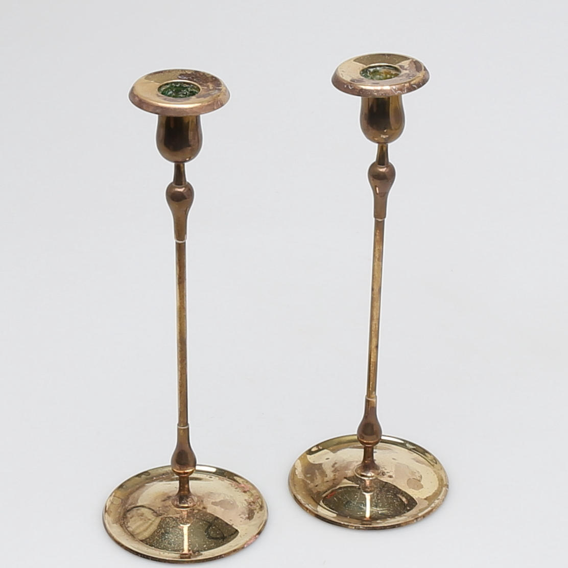 LJUSSTAKAR i mässing, ett par, Ystad Metall, Gunnar Ander.