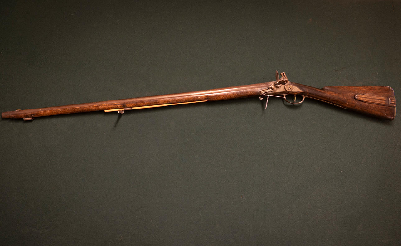 A flintlock rifle, left, 18th century. Weapons & Militaria - Guns ...