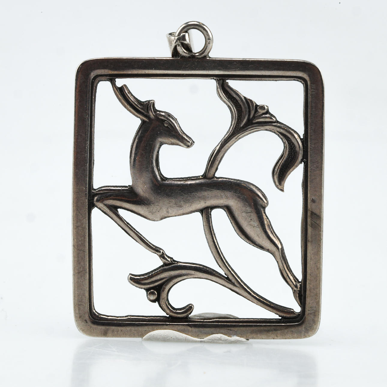 A silver pendant by Eiler & Marlöe, Copenhagen.