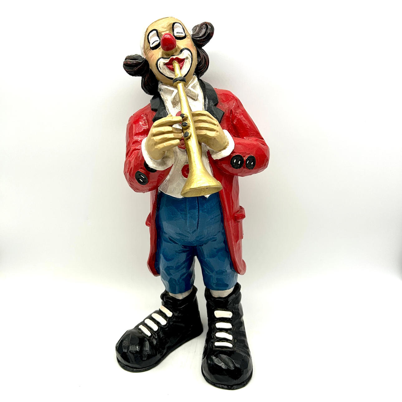 TIMELESS ELEGANCE: GUILD CLOWN IN GERMAN PRECISION WORK WITH TRUMPET.