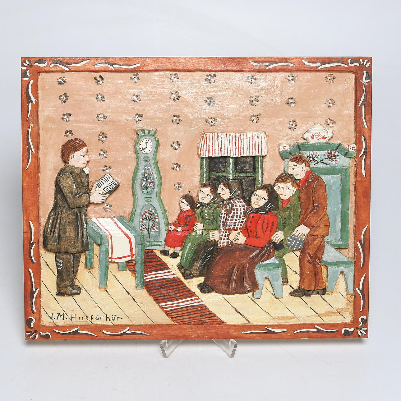 IDA MALM. "Husförhör", relief i trä, monogramsignerad.