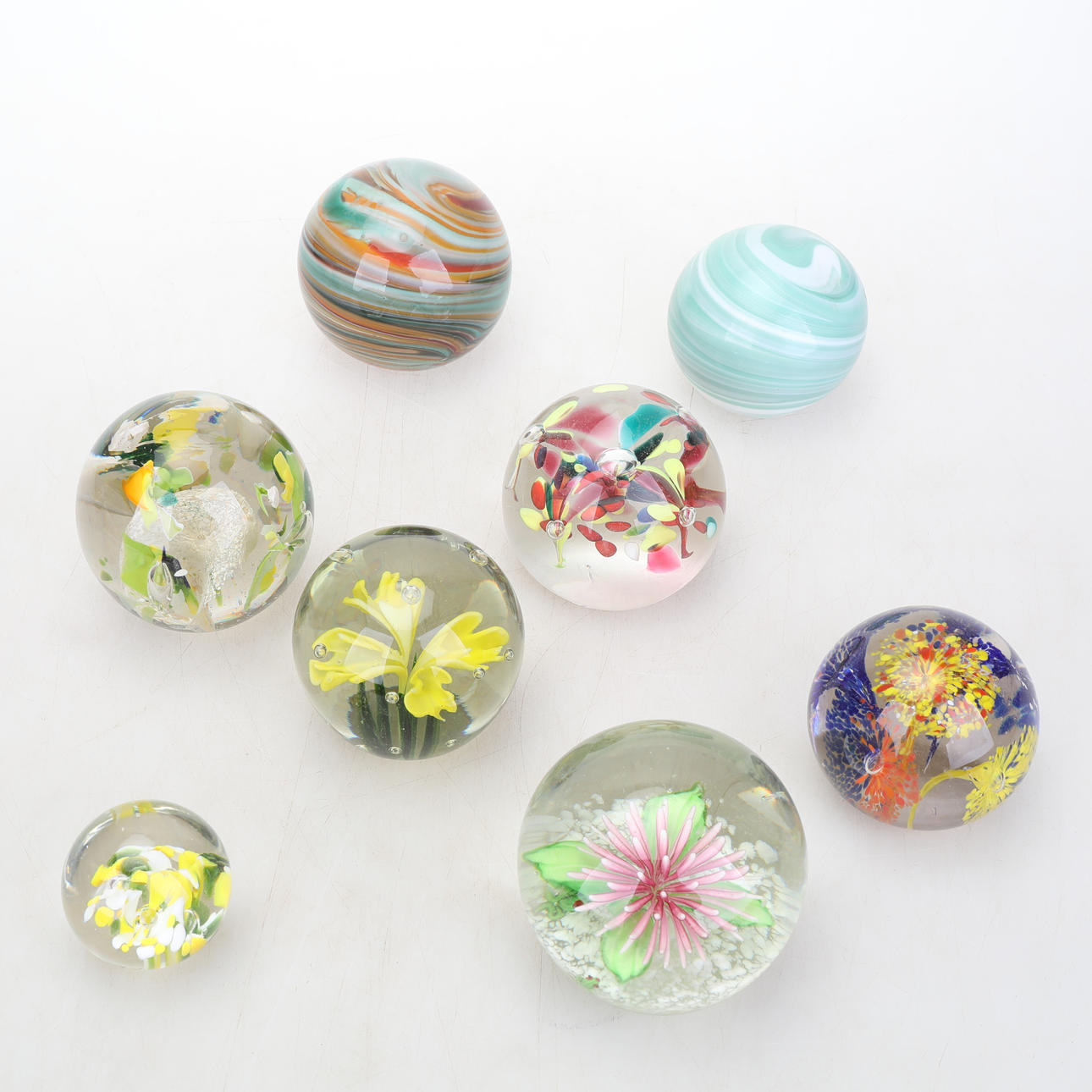 Buchpressen aus Glas, 8 Stück.