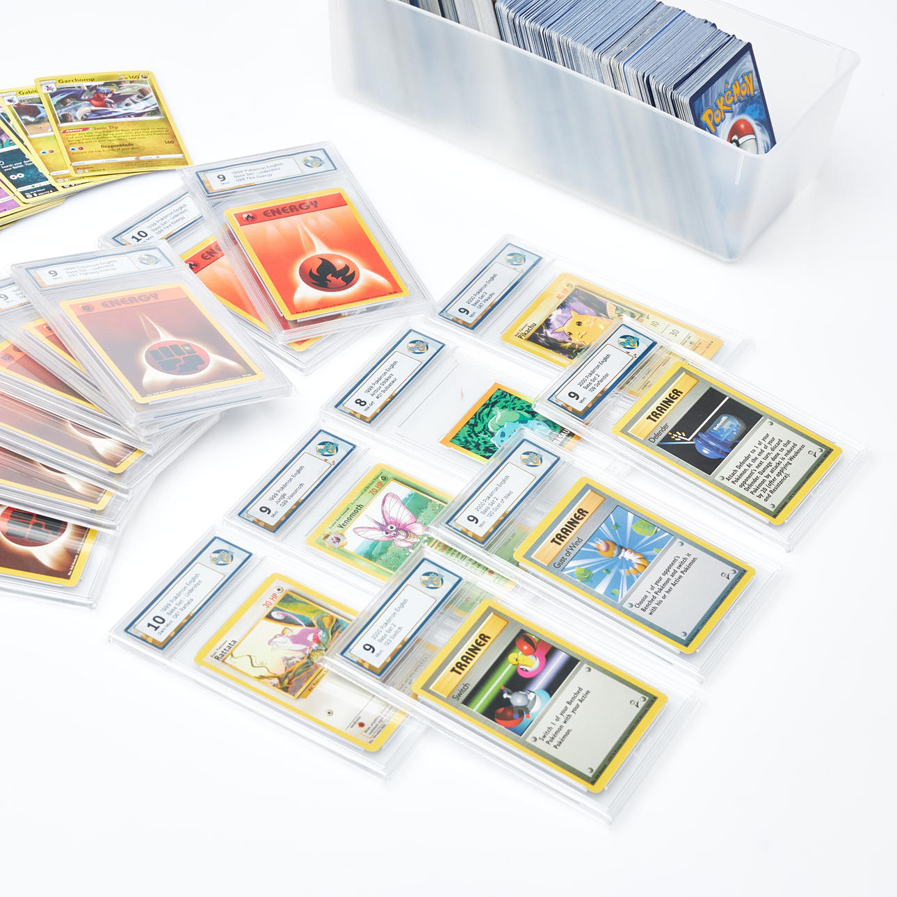 POKMON CARDS, 15 graded, 1999-2000, Base set 2, Unlimited and Jungle,  Raukcard, graded 7-10, and about 600 mixed generations and vintages. Toys -  Toys - Auctionet