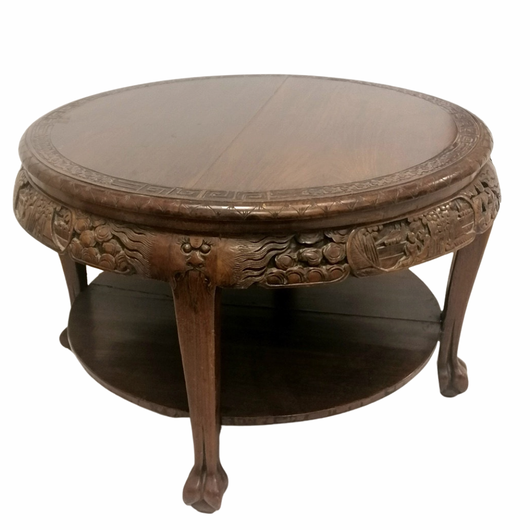 MESA BAJA CIRCULAR ORIENTAL DE MADERA DURA TALLADA.