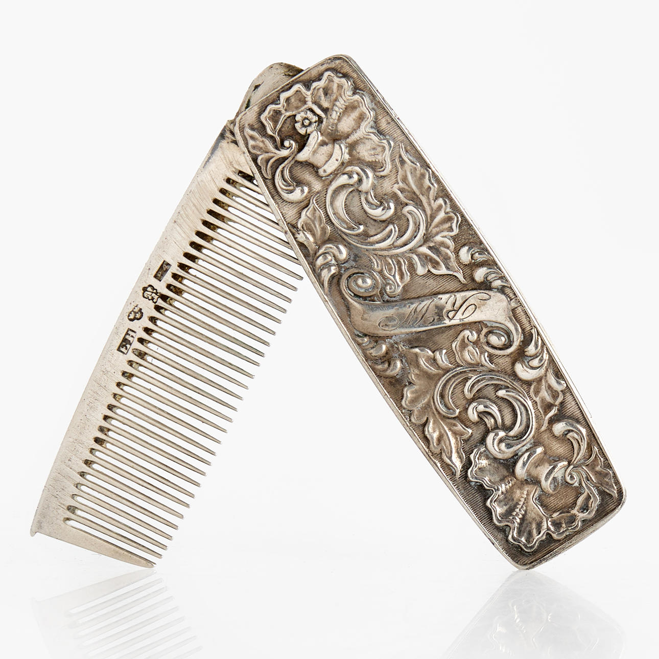 Un peine, plateado, plegable, 1845.