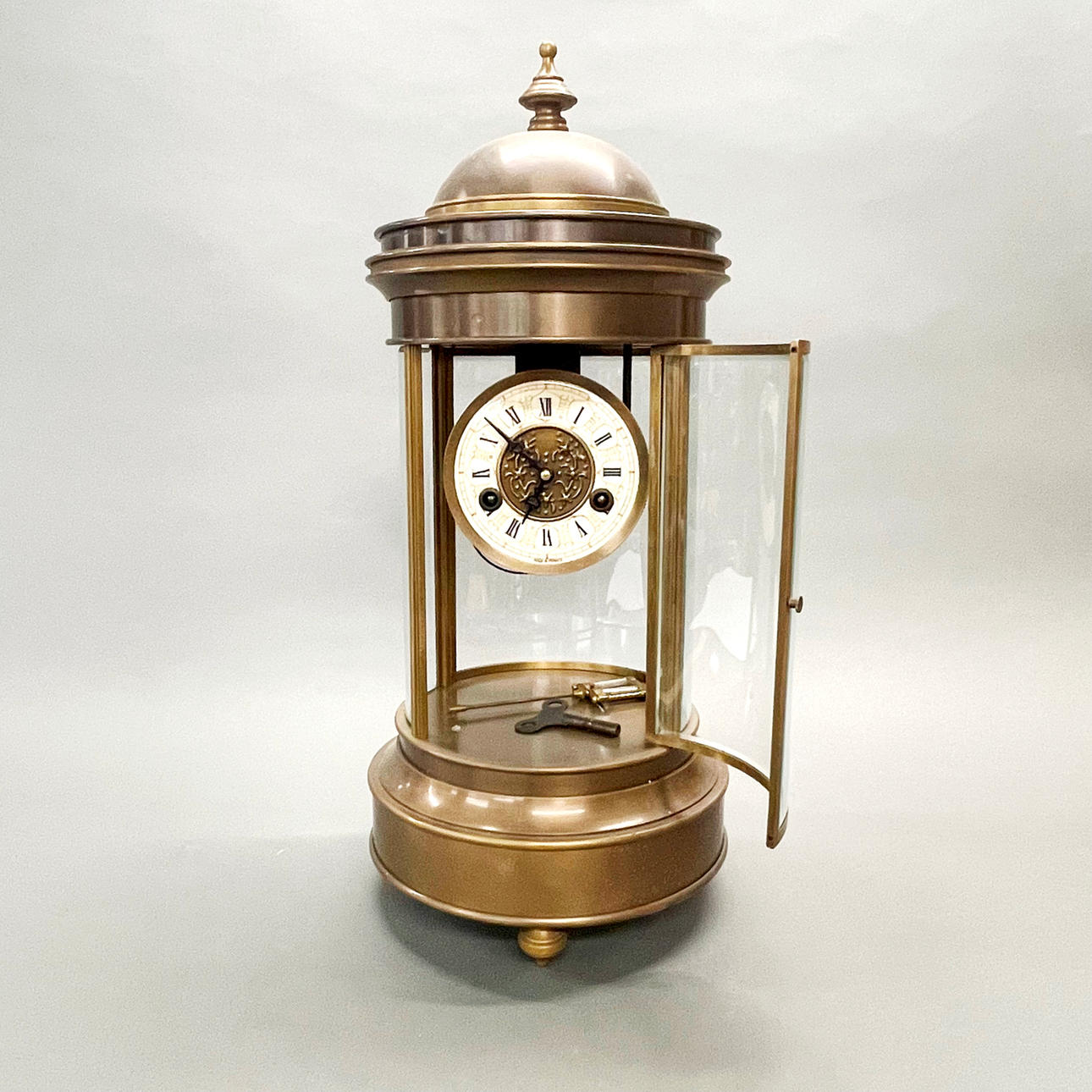 FRENCH FOUR-PANEL CYLINDER MANTLE CLOCK.