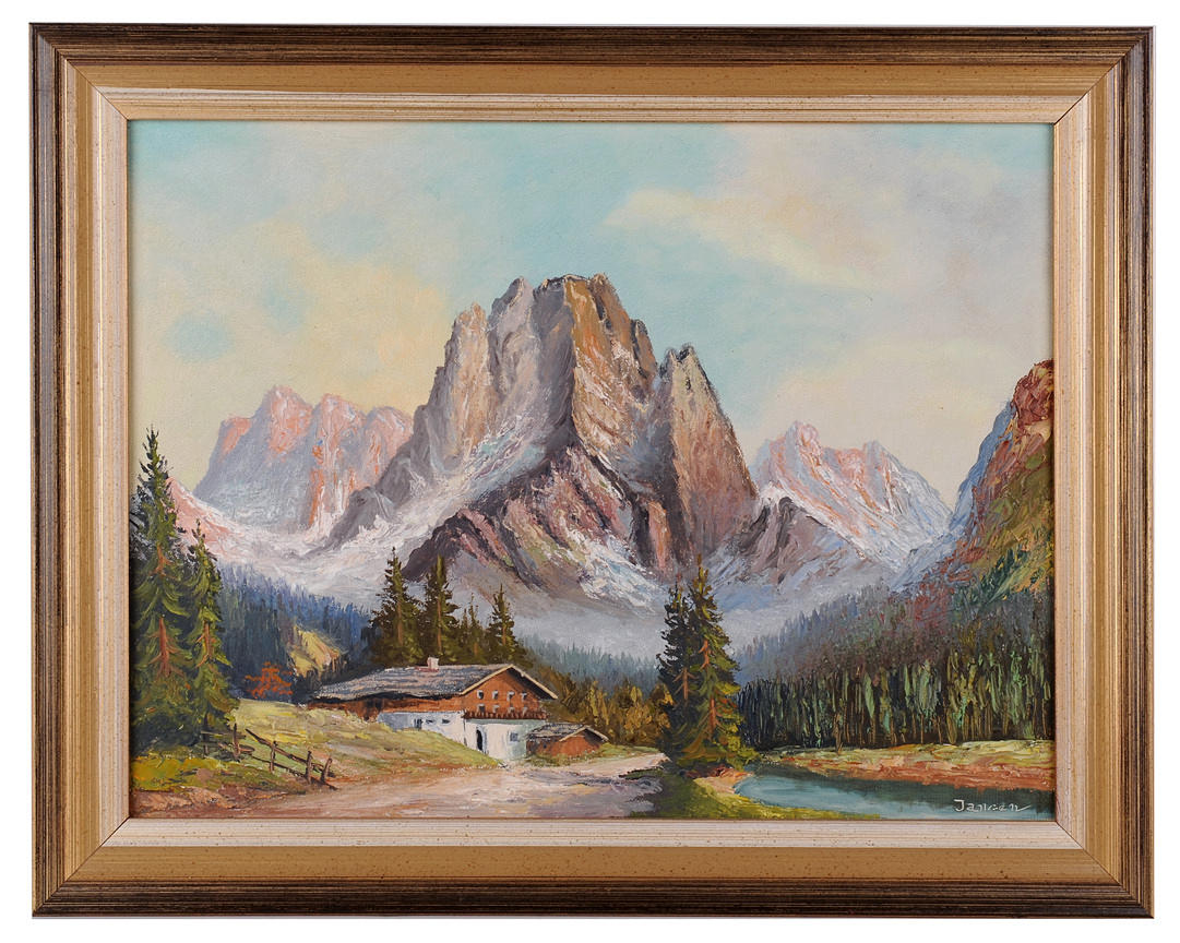 SIGNIERT JANZEN. Hut framför höga bergsmassivet.