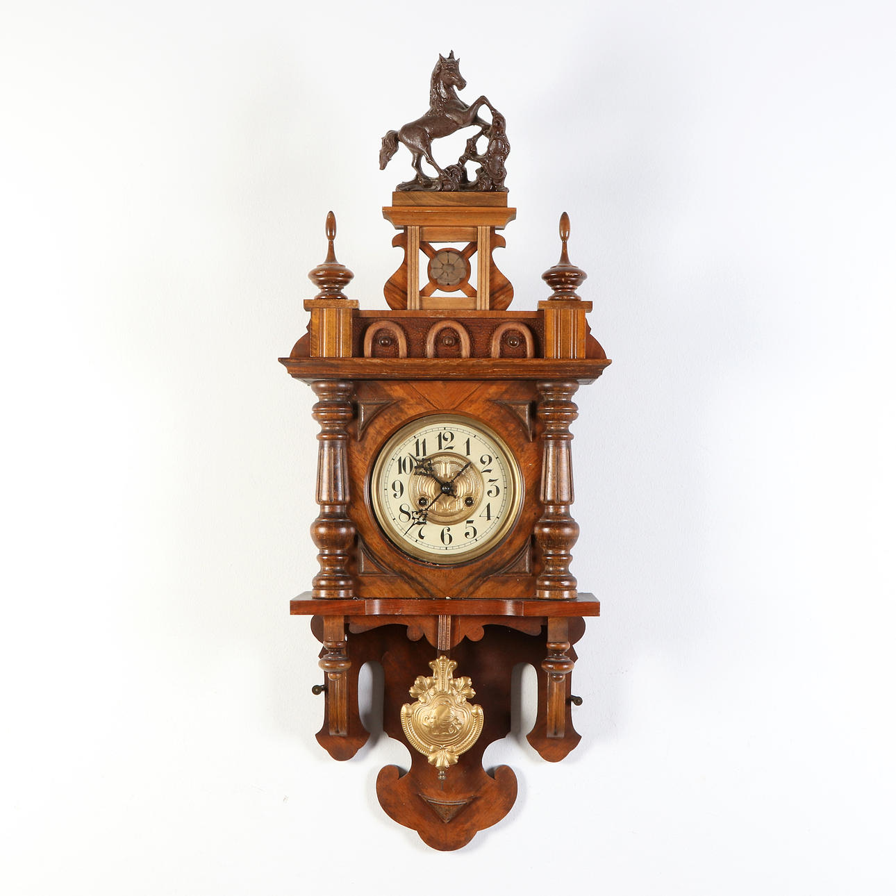 MANOR CLOCK. Walnut, beech, etc. Around the year 1900.