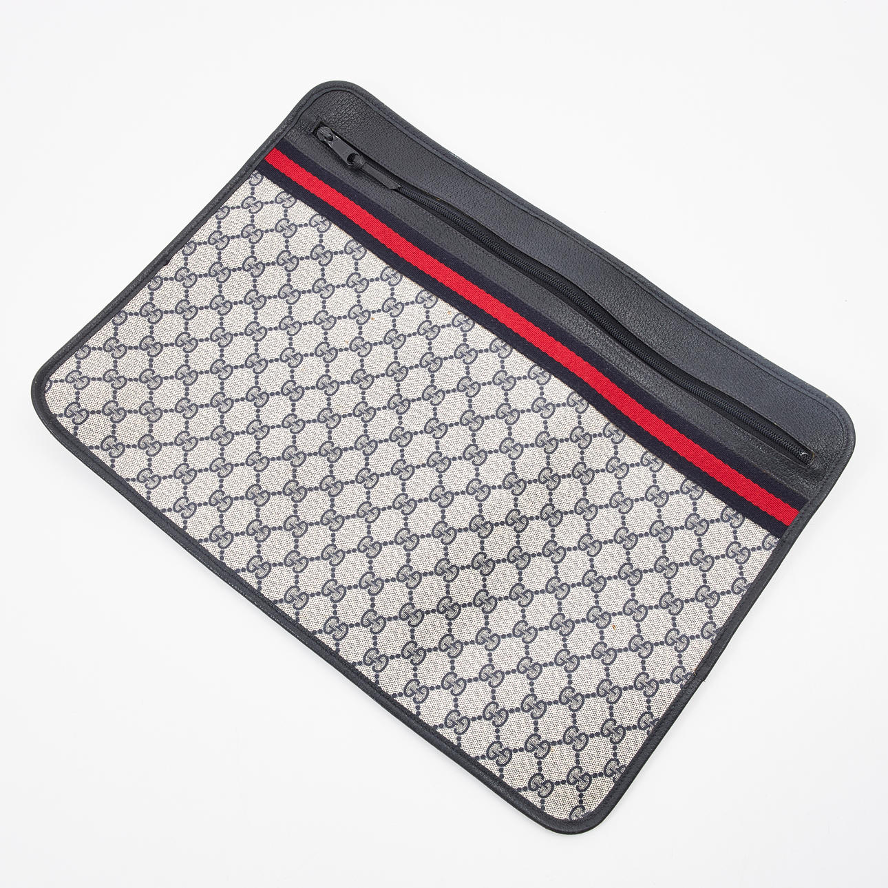 GUCCI. Portafolio, monograma, lienzo.