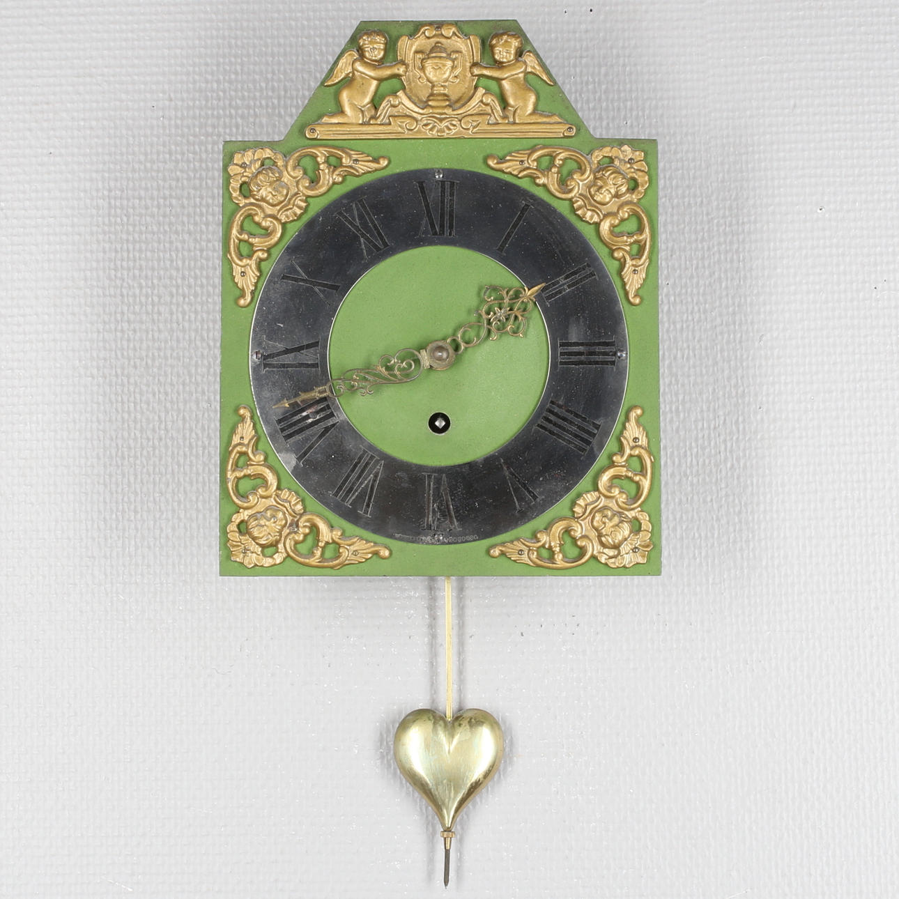 VÄGGUR, plåt, trä, metall och mässing, Westerstrands urfabrik, Töreboda, 1900-talets senare hälft.