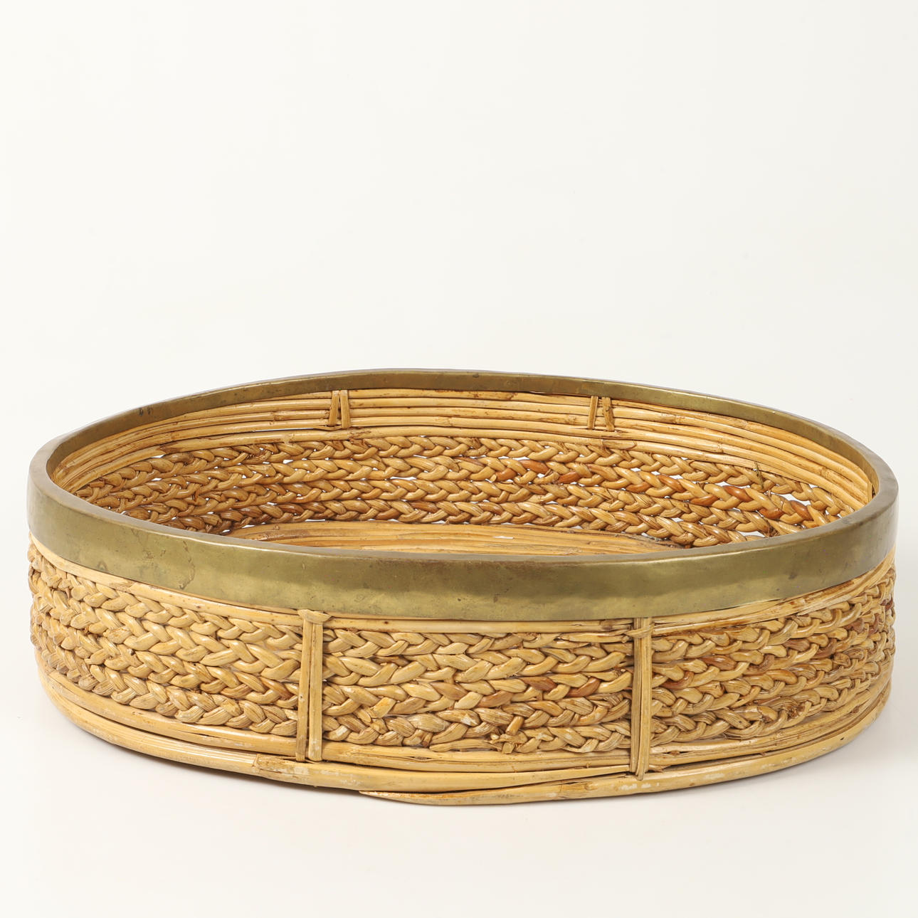 A basket, braided with brass edge, 20th century.