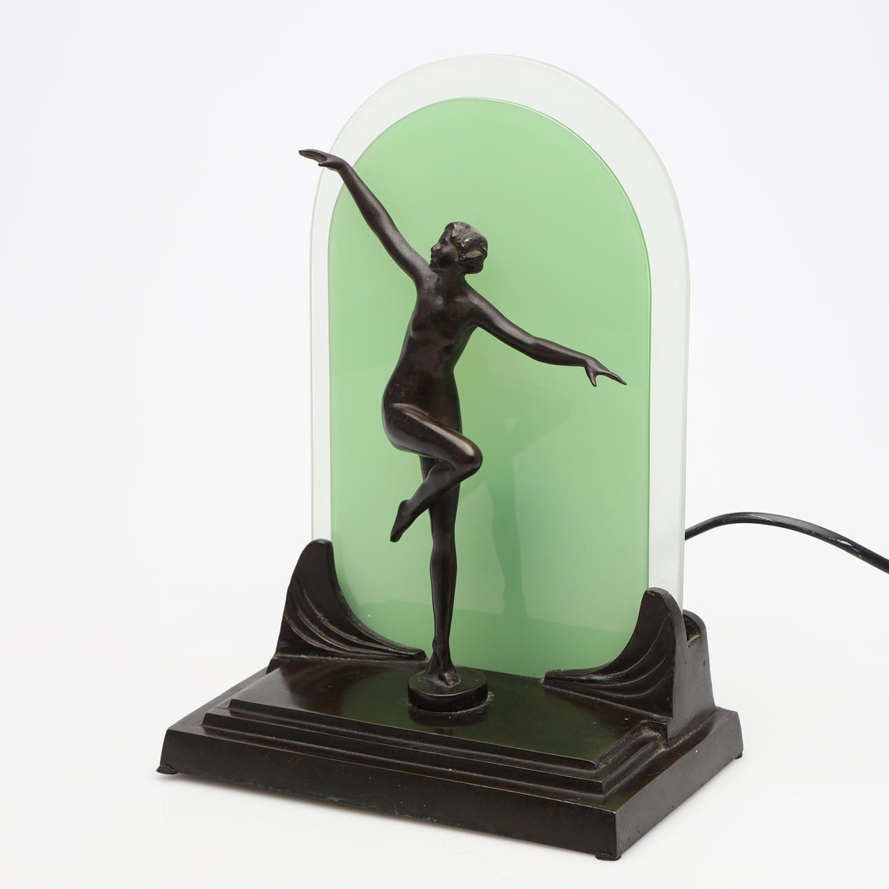 A table lamp, art deco, bronze and glass.
