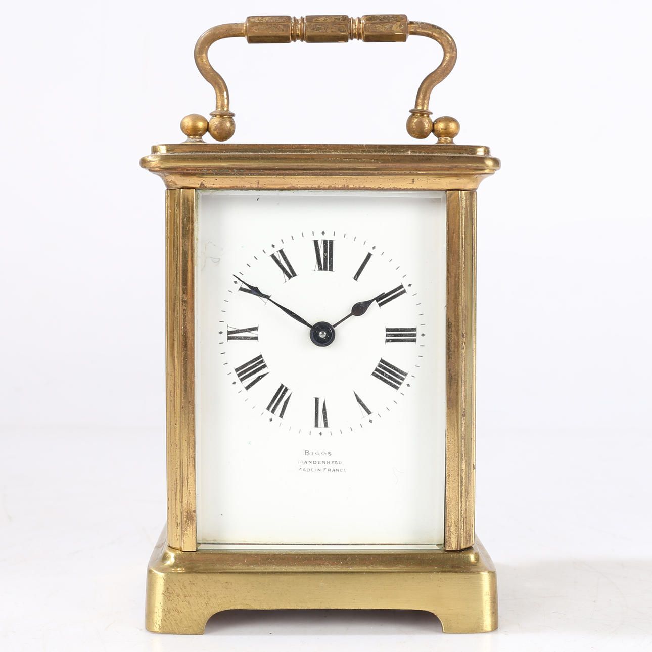A 20TH CENTURY BRASS CARRIAGE CLOCK BY BIGGS.