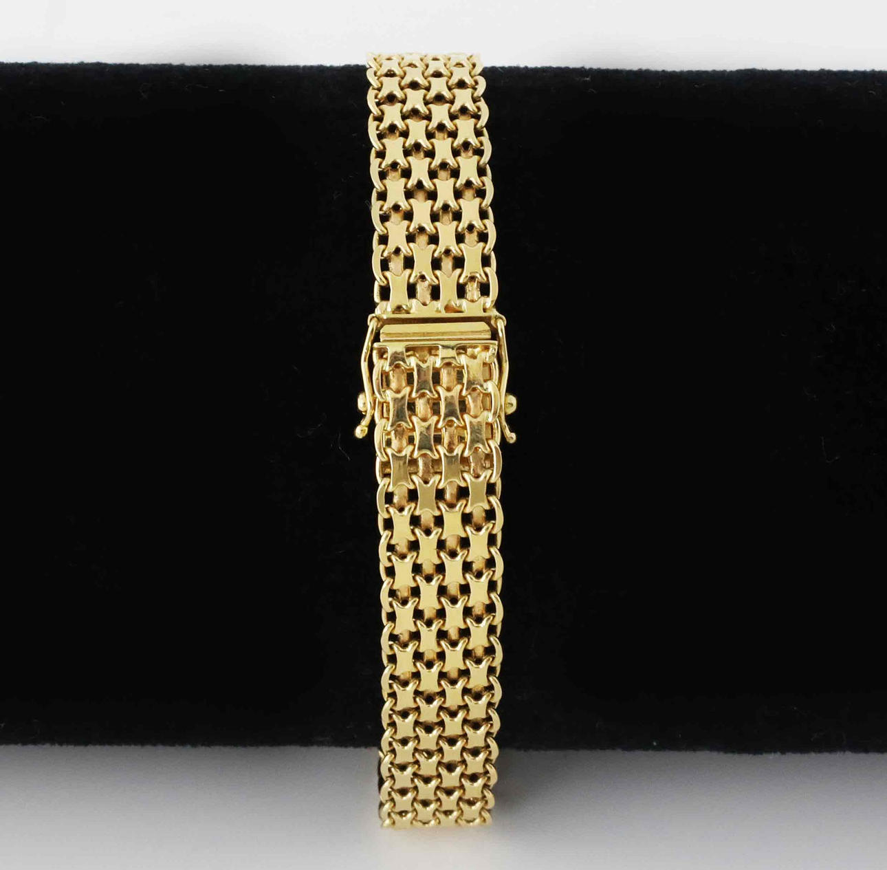 KLOCKARMBAND, guld 18K.