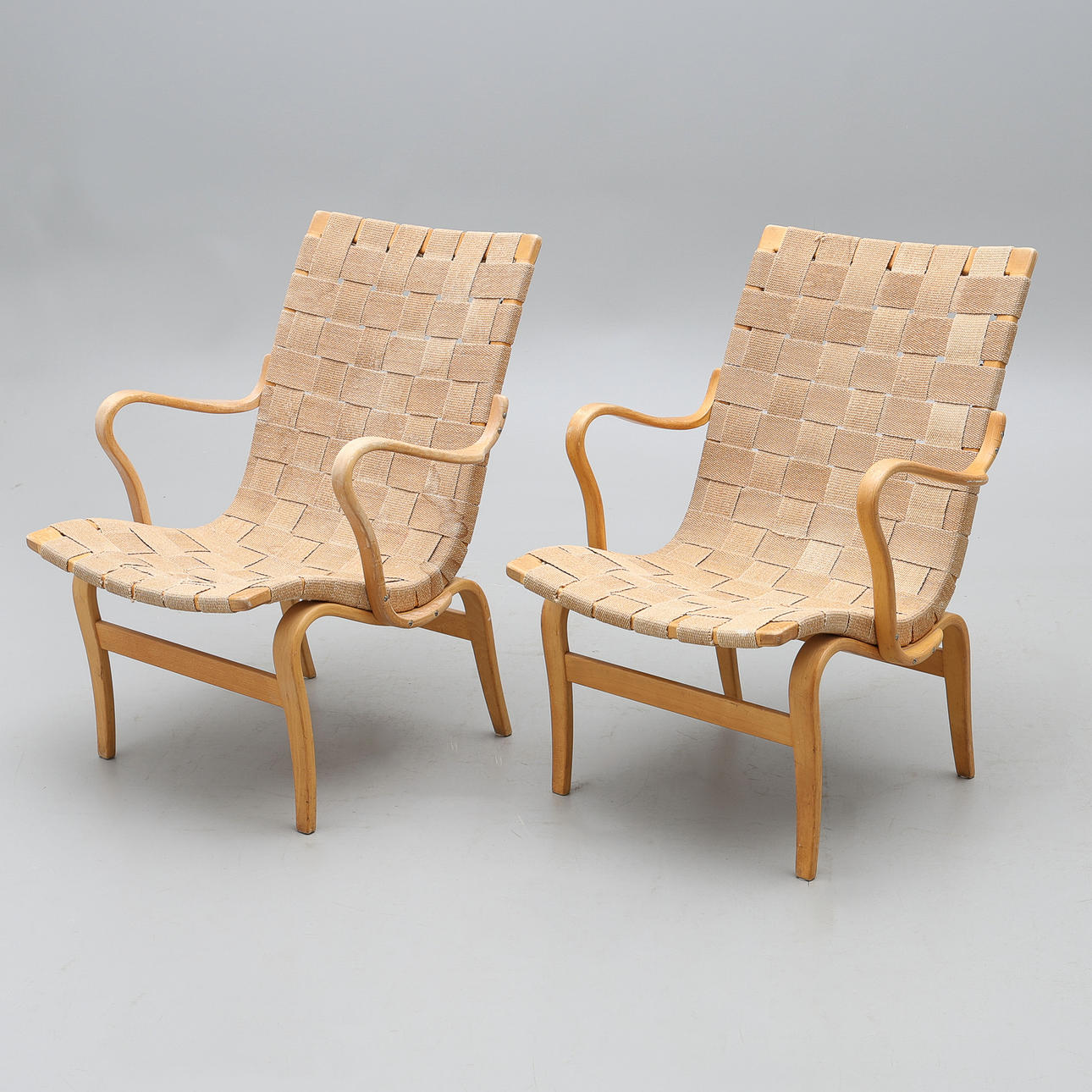 BRUNO MATHSSON. “EVA”, A COUPLE. beech and saddle cloth.
