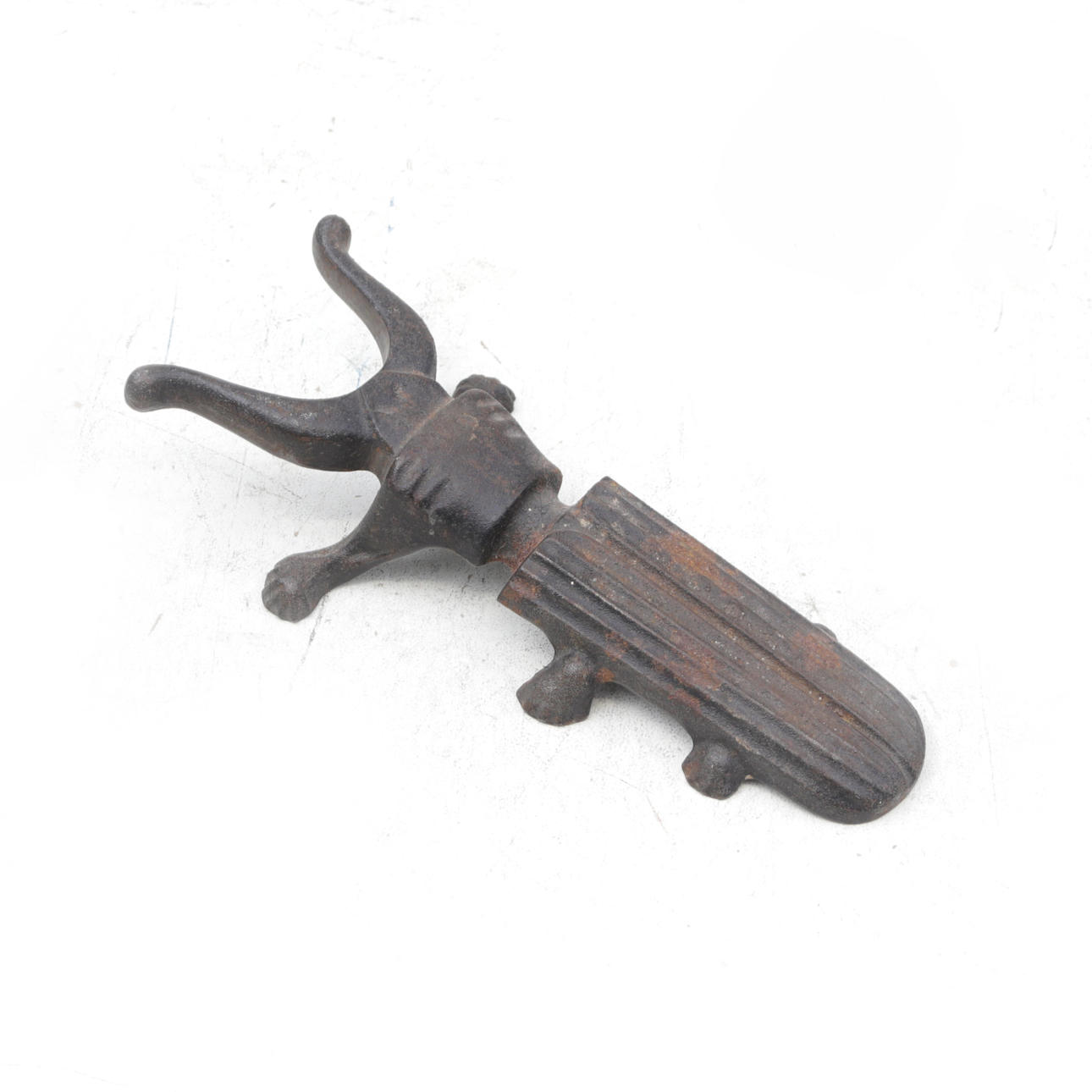 STÖVELKNÄKT, gjutjärn.