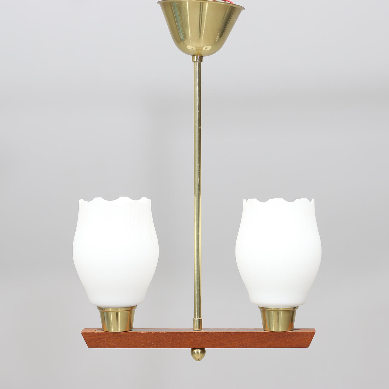 A teak/brass ceiling lamp, circa mid 20th century.