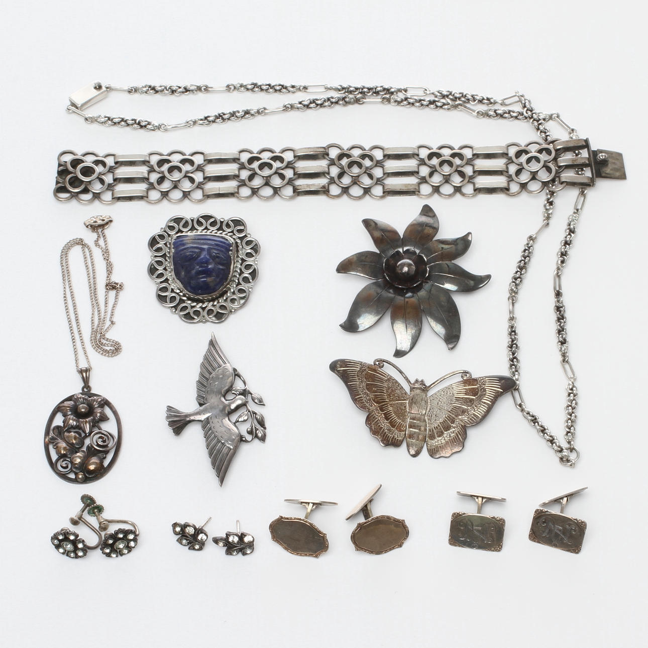 SMYCKEN, 11 delar, silver, 1900-tal.