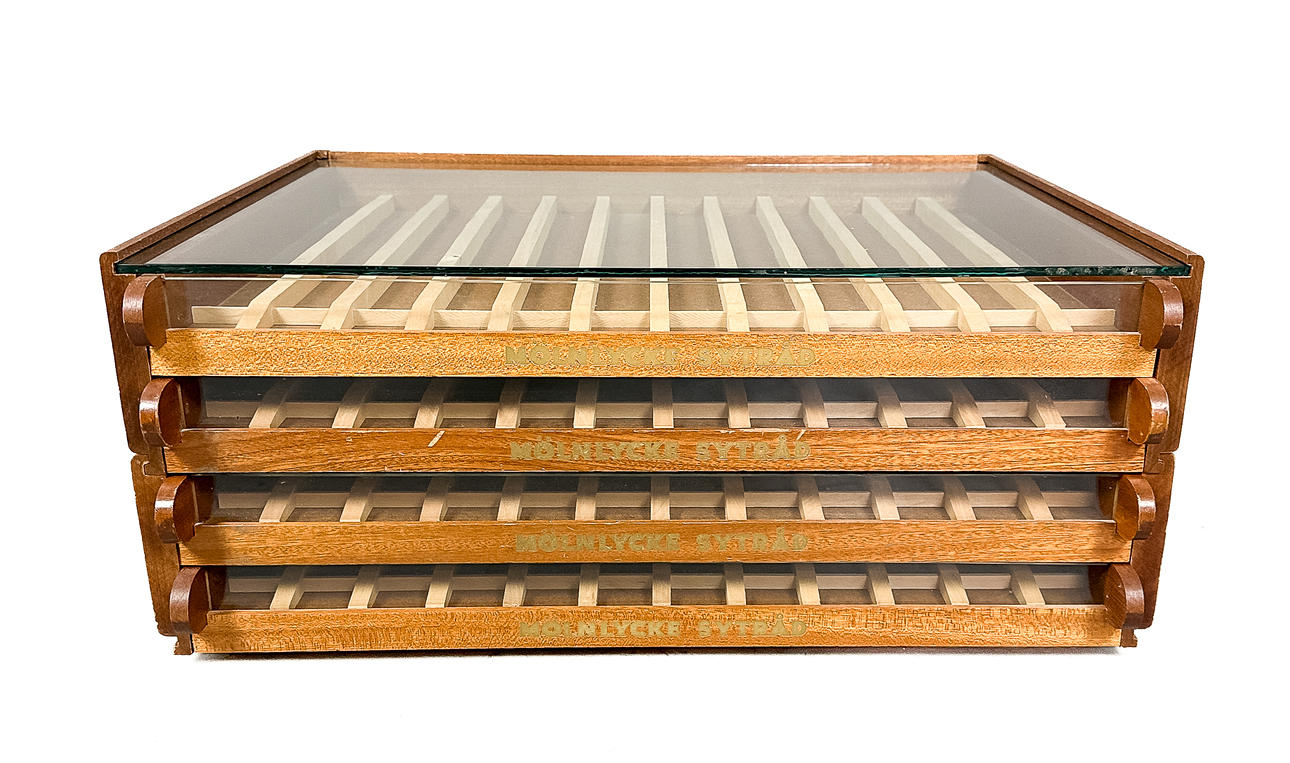 TRÅDRULLEFÖRVARARE, Mölnlycke Sytråd, 1900-tal.