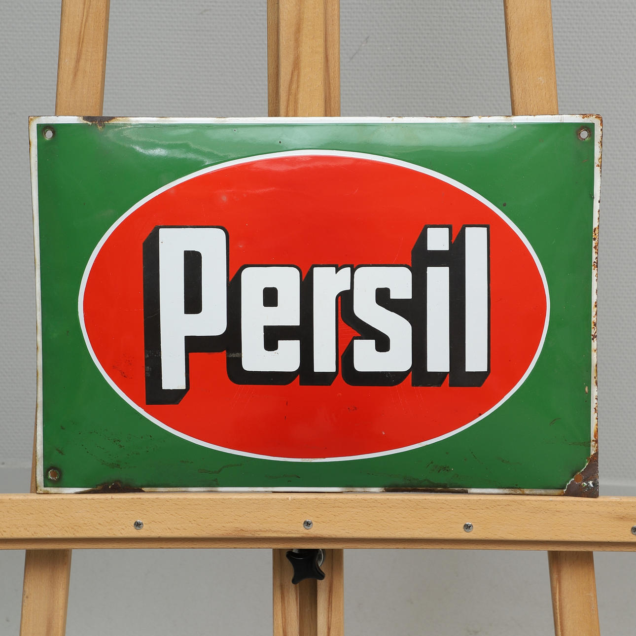 A cuped enamel sign, “Persil”, mid 20th century.