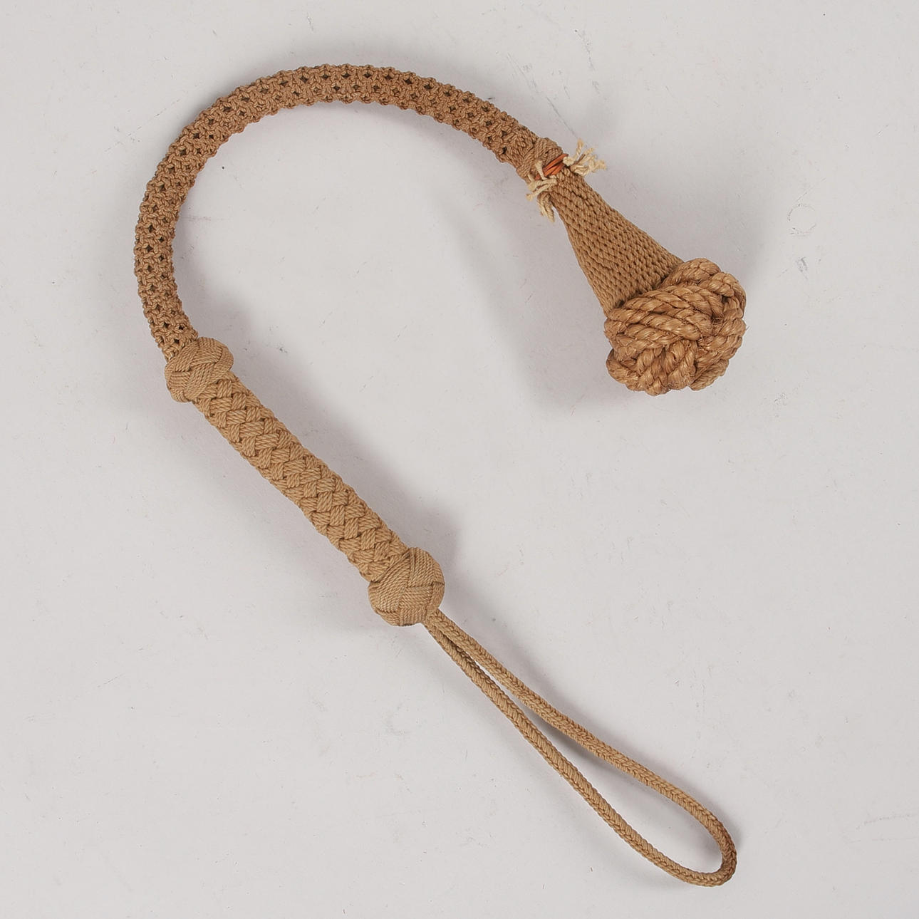 A marine punishment tool, rope with knobs, 20th century. Weapons ...