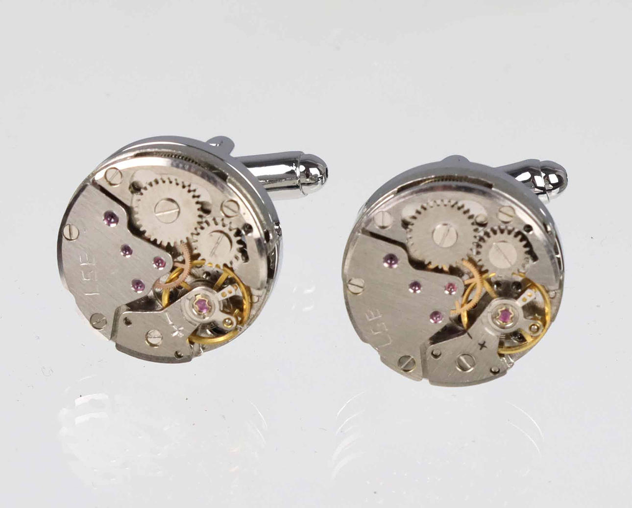 MANSCHETTENKNÖPFE, Uhrwerk Form.