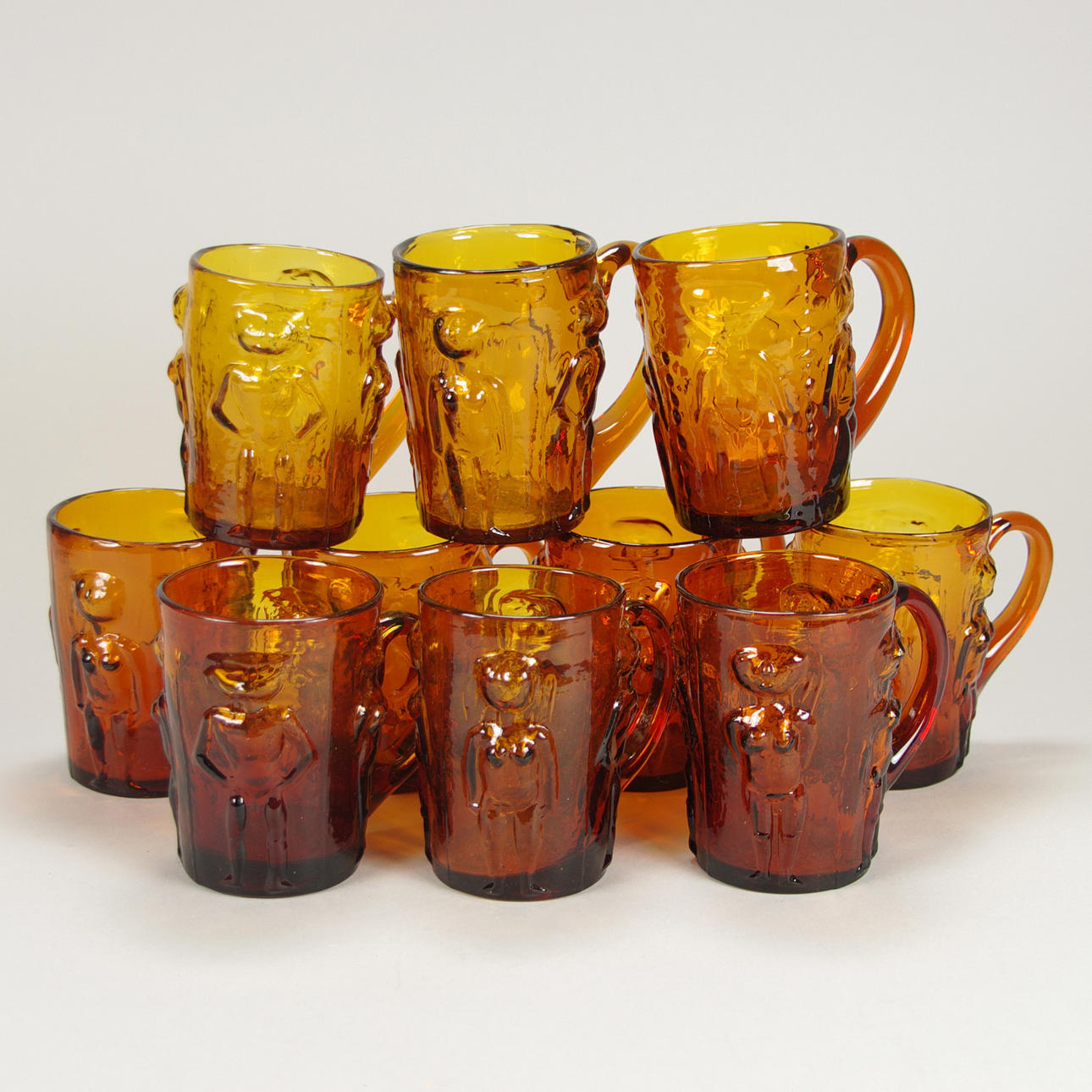 MUGGAR, 10 stycken, brunt glas, Erik Höglund.