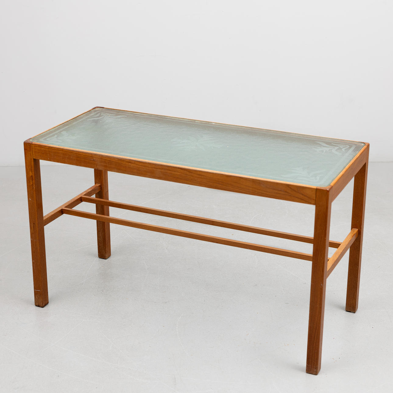 COFFEE TABLE, glass and wood. 1940s.