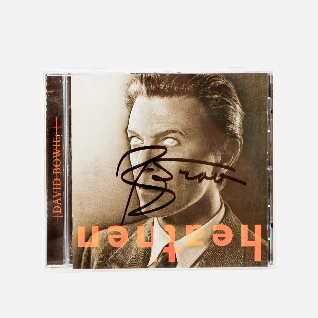 DAVID BOWIE. Signed CD cover “Heathen” from 2002.