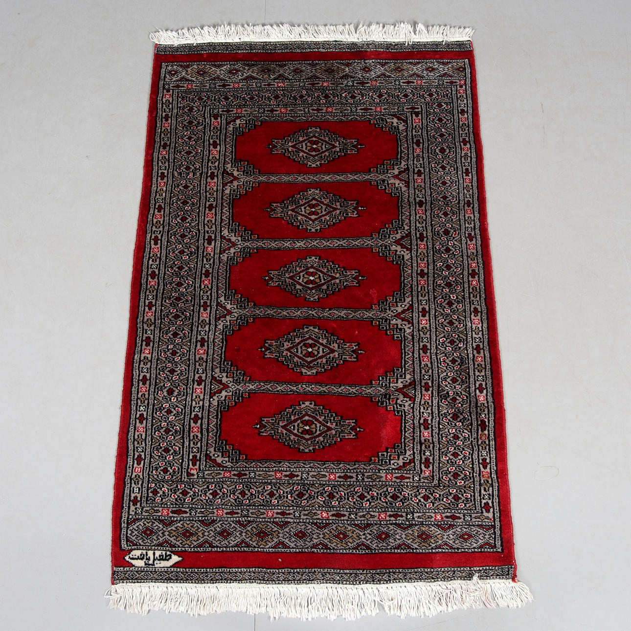 A CARPET, Bokhara, 132 x 80 cm.