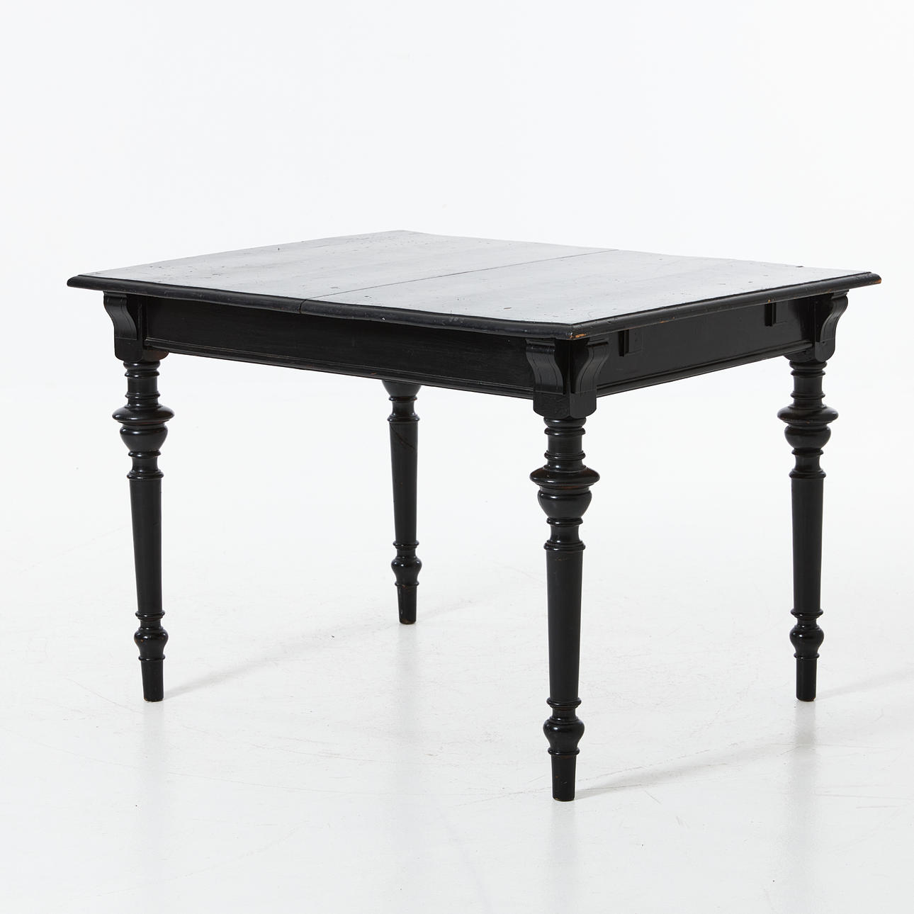 Renaissance-style table with two inserts.