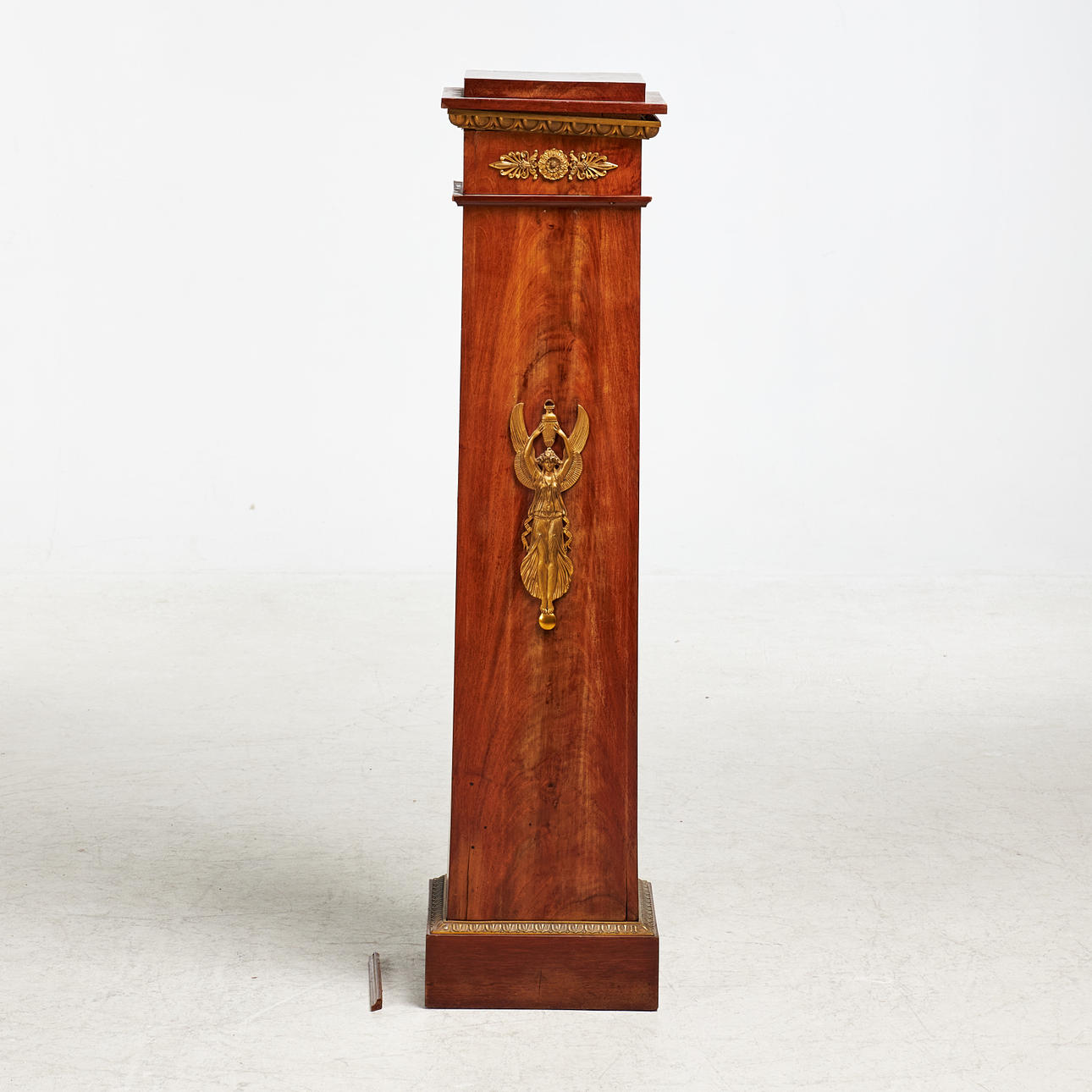 PEDESTAL, empire, walnut veneer, decor elements in bronze.