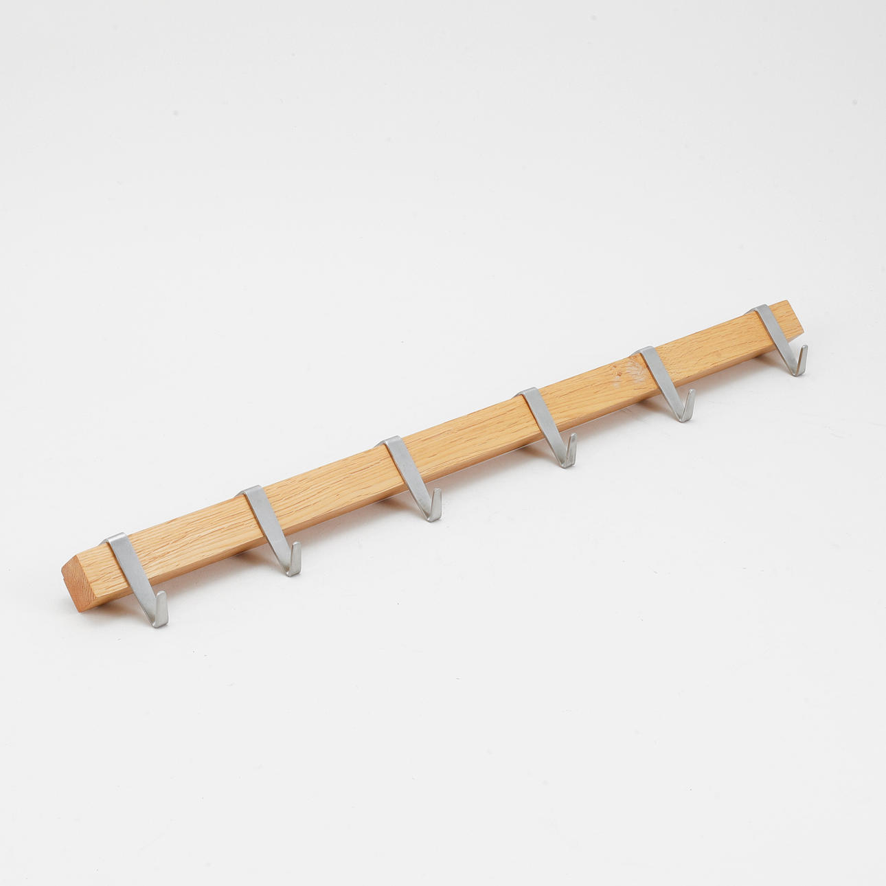Wall hooks, wood and metal, Hold, Design by Pascal Charmolu.