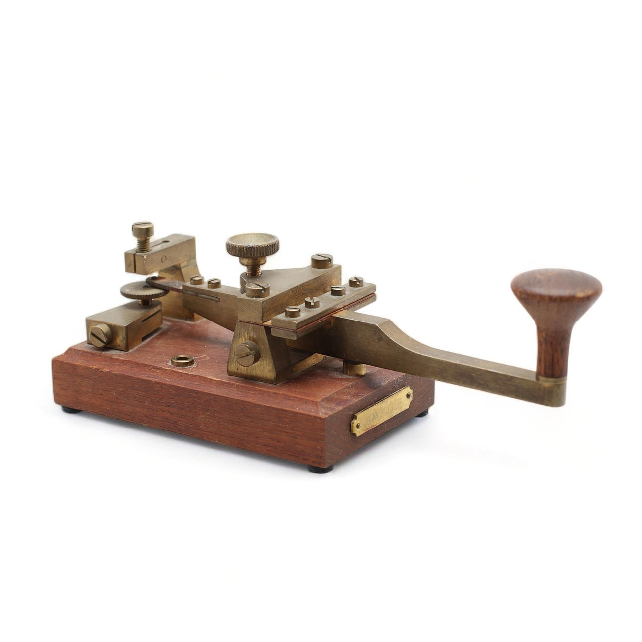 A brass telegraph key, marked SMSJBB, 20th century.