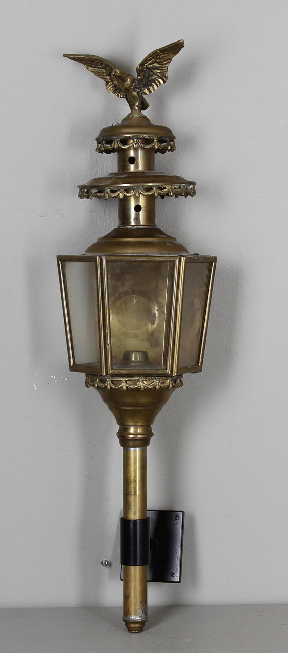 VAGNSLYKTA, gulmetall, omkring 1900.