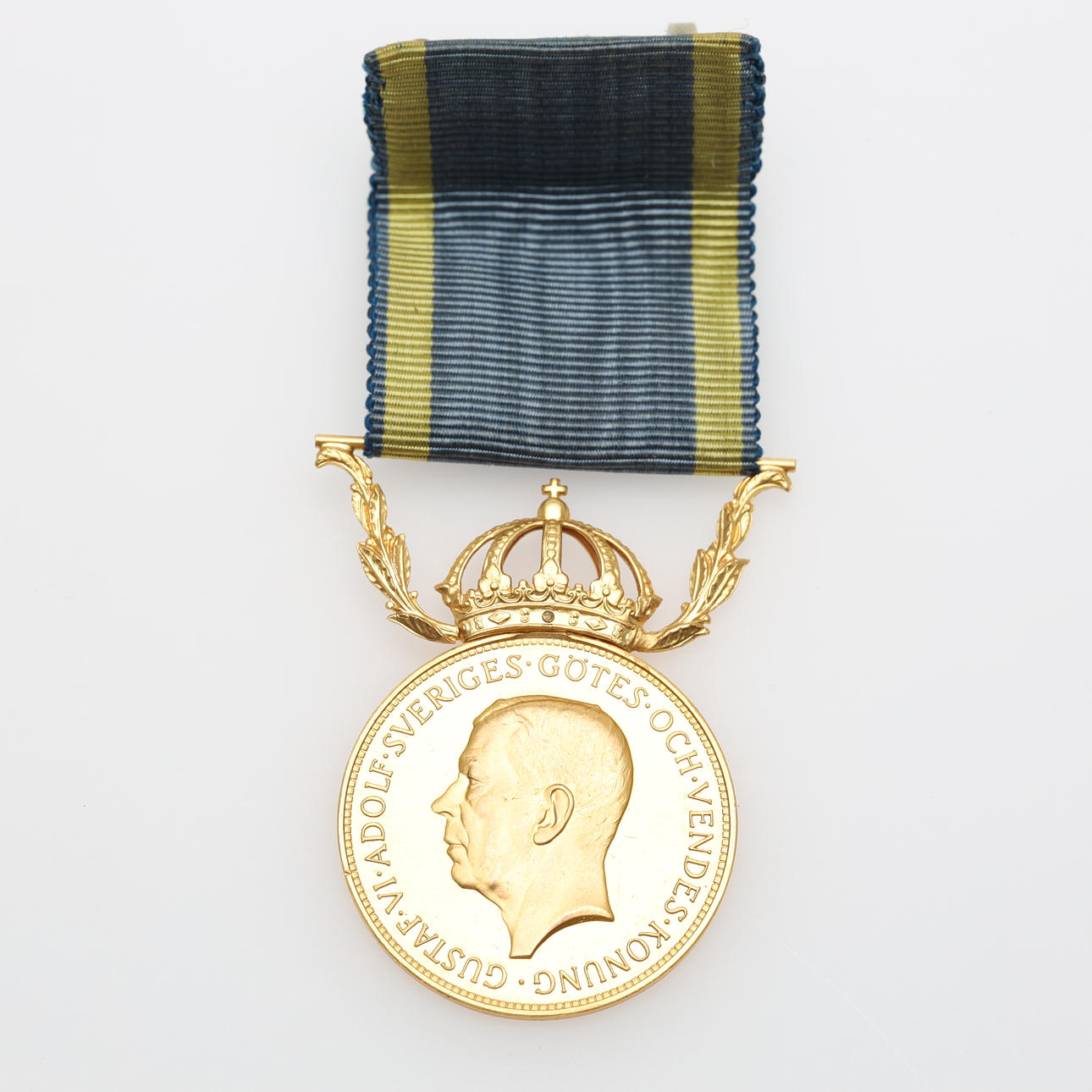 MEDAL OF MERIT, 18K and 23K gold, “For rigor and honesty in the service ...