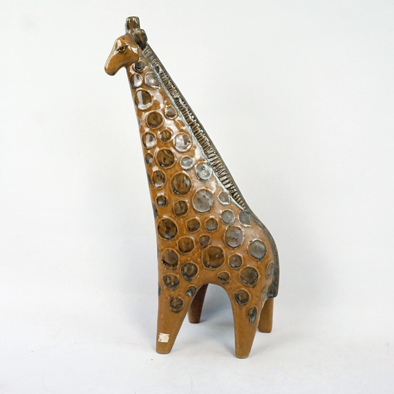 LISA LARSON. A stoneware figurine, “Giraffe”, from the series
