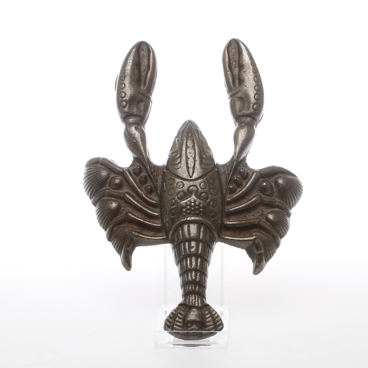 STÖVELKNEKT i form av kräfta. Järn, England. 1900-talets andra hälft.