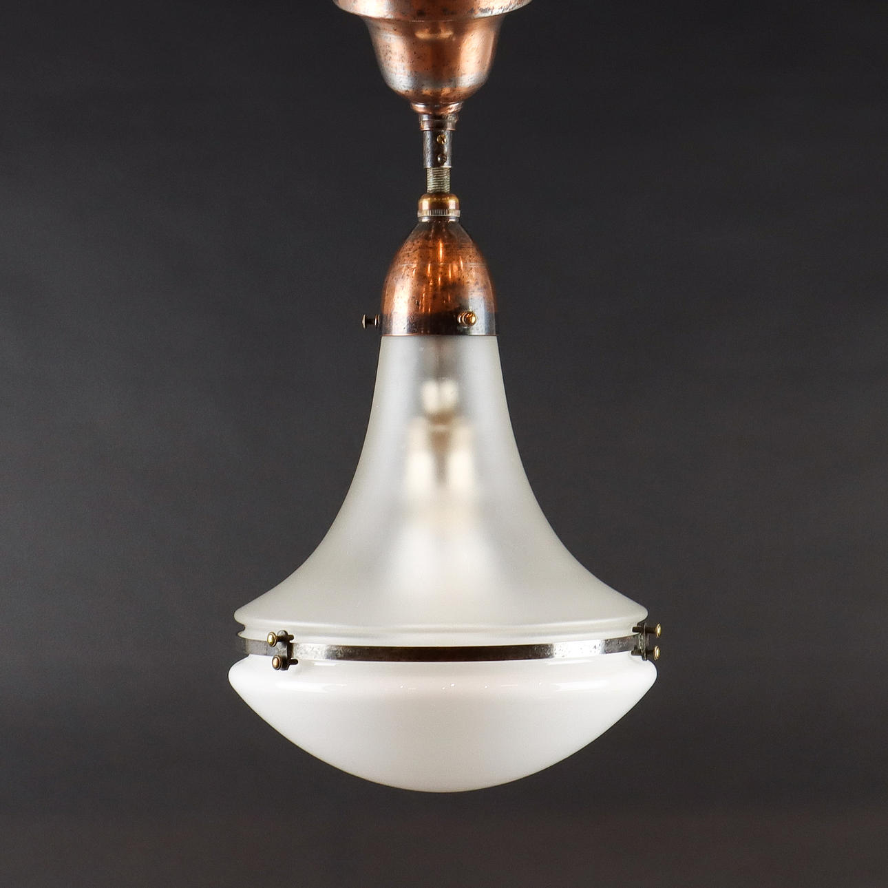 A “Luzette” ceiling lamp by Peter Behrens.