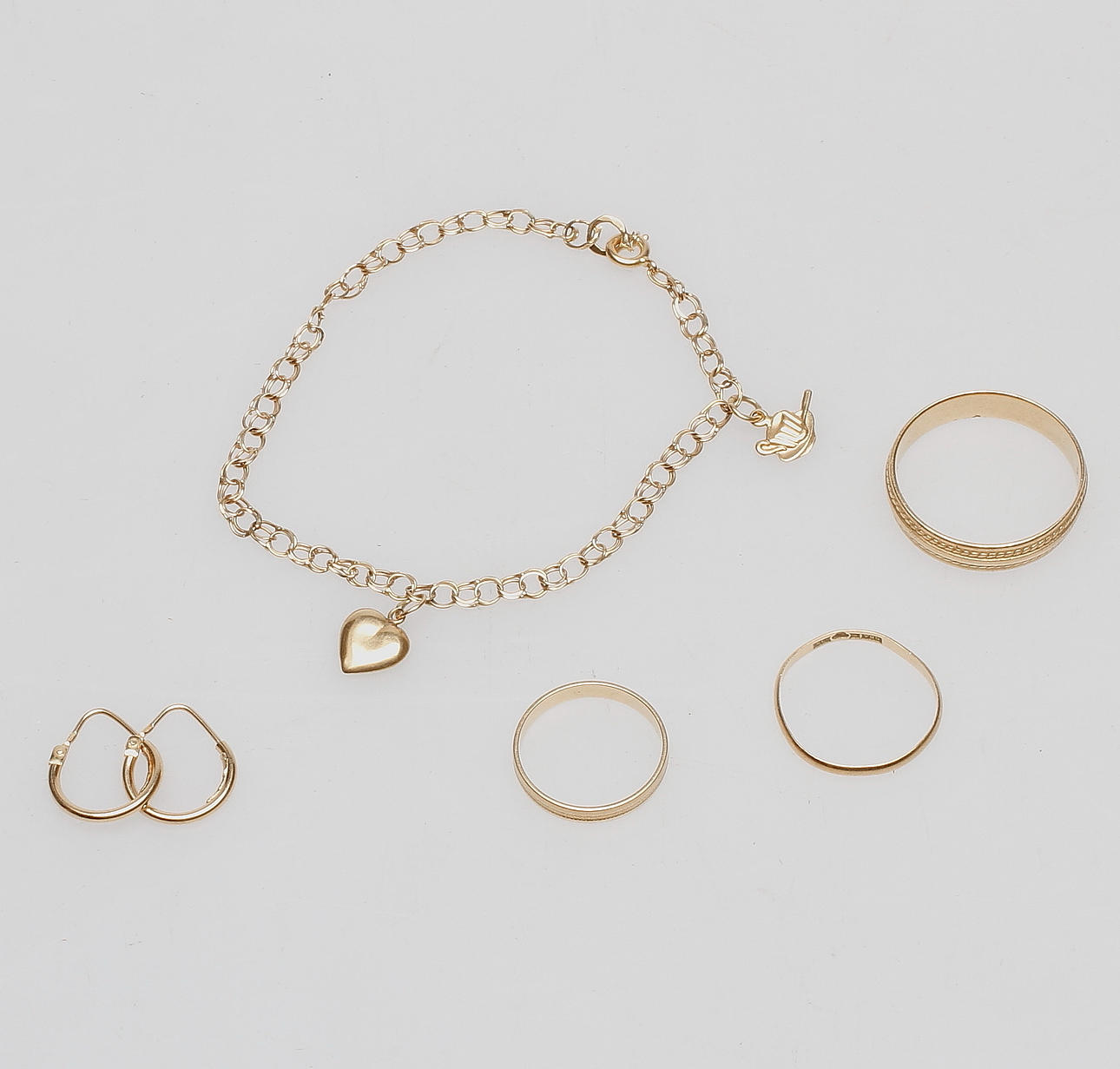 GULDSMYCKEN, 18k guld, vikt ca 10.2 gr.