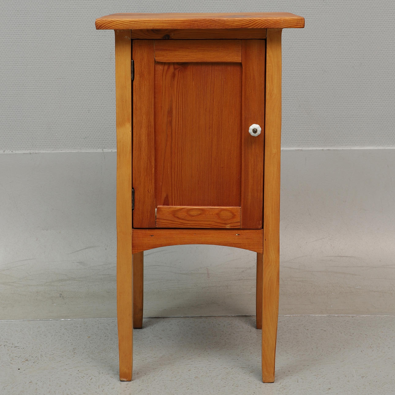 A wooden bedside table, 20th century.