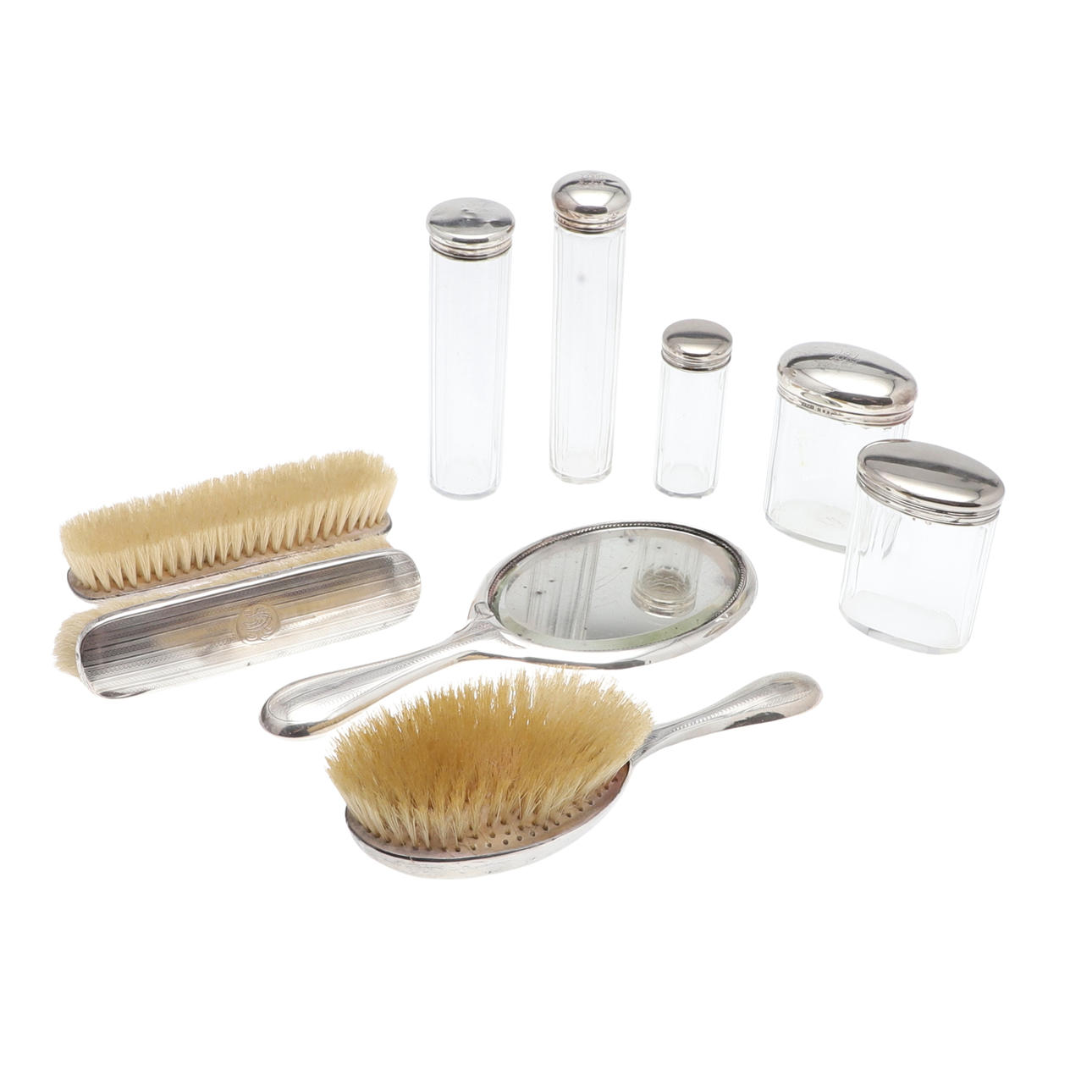 A SILVER BACKED DRESSING TABLE SET AND JARS.