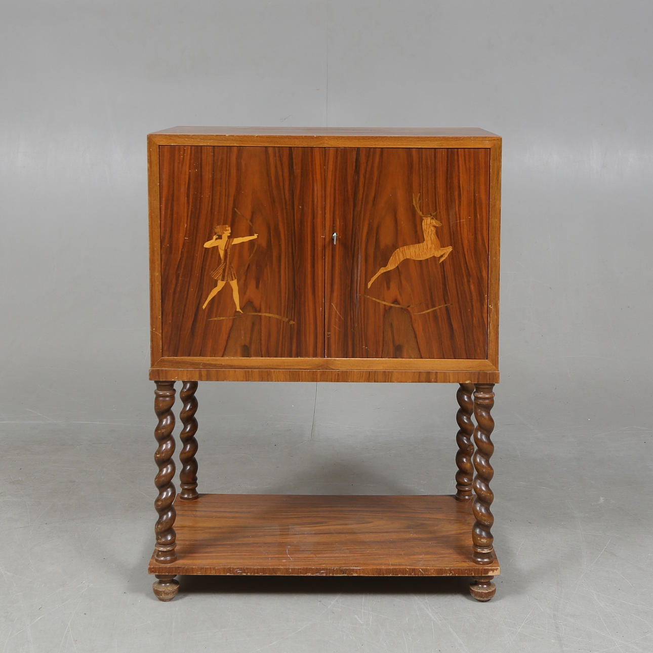 A 1940s/50s bar cabinet.