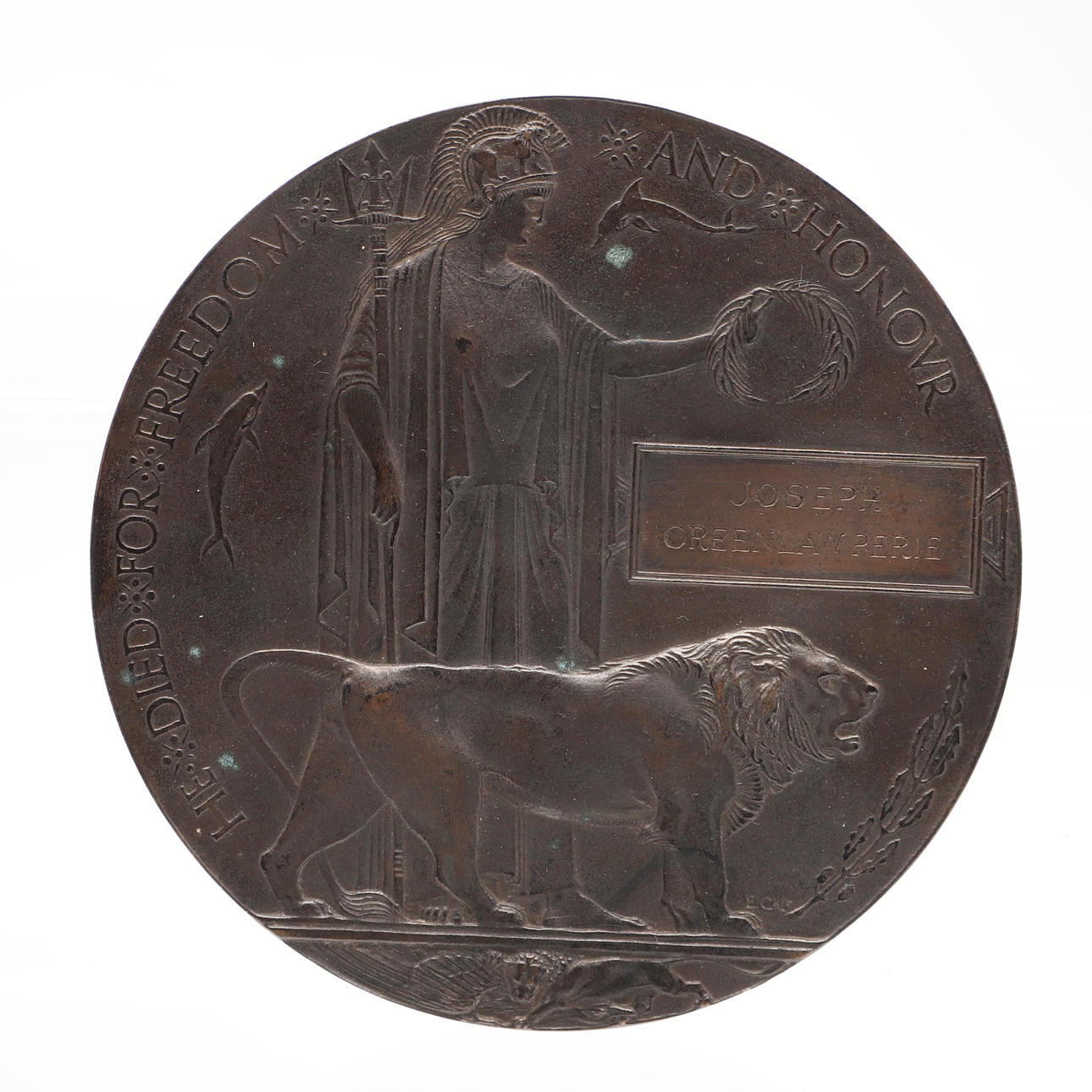 A MODIFIED FIRST WORLD WAR MEMORIAL PLAQUE.