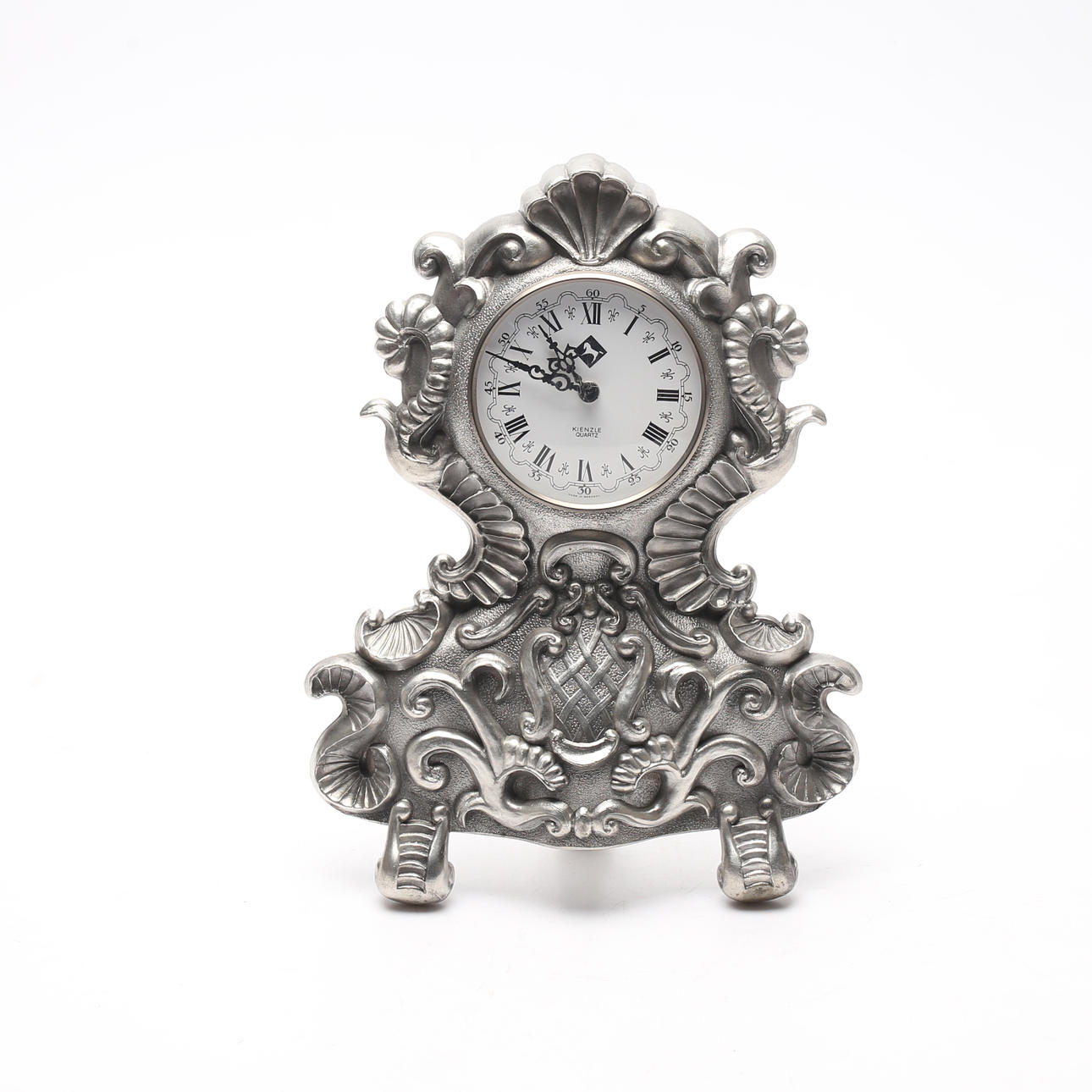 A Kienzle rococo pewter table clock, Germany, 20th century.